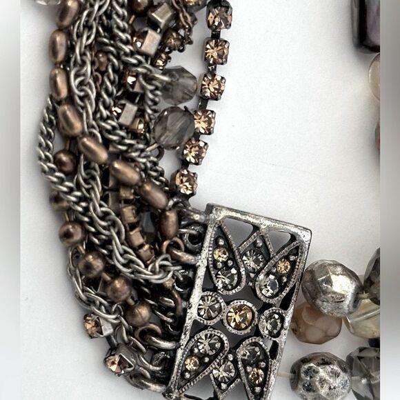 Multi-strand chains, rhinestones, brown and neutral-toned beads bracelet. - Picture 5 of 7